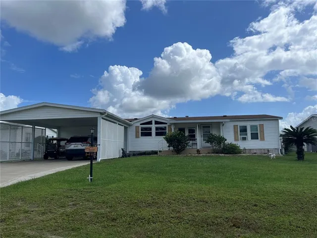 a view of a yard in front of house