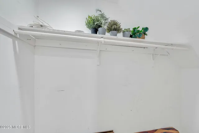 a view of entryway with washer and dryer