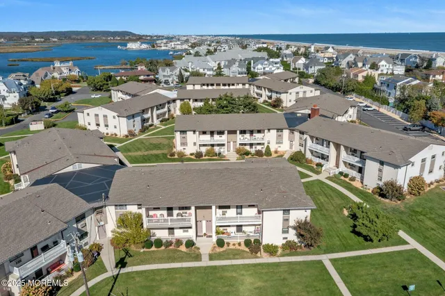 an aerial view of a house with outdoor space