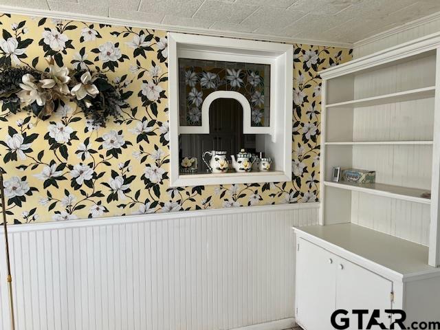 216 Arch Davis Road Pittsburg, TX 75686 - Photo 12 of 20 a close view of a sink and dishwasher with wooden floor