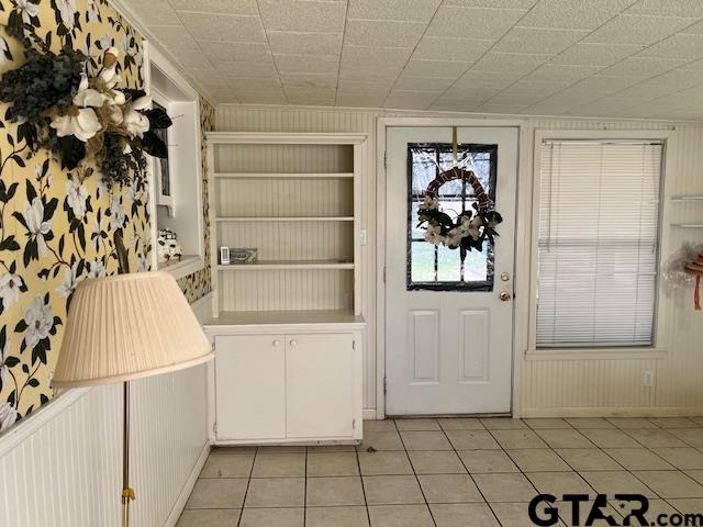 216 Arch Davis Road Pittsburg, TX 75686 - Photo 17 of 20 a view of a storage & utility room with washer and dryer