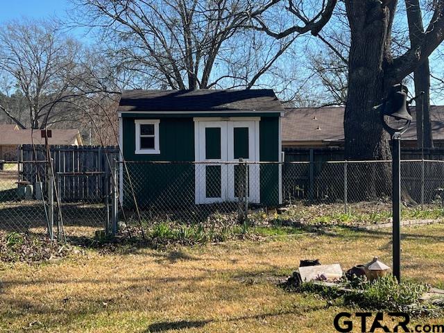 216 Arch Davis Road Pittsburg, TX 75686 - Photo 18 of 20 a front view of a house with garden