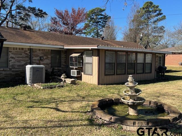 216 Arch Davis Road Pittsburg, TX 75686 - Photo 20 of 20 a view of a house with backyard patio and backyard