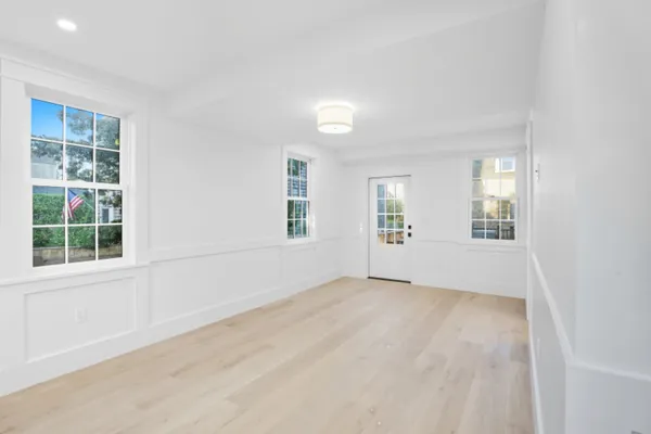 an empty room with windows