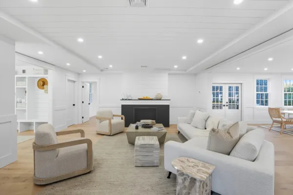 a living room with furniture and a couch