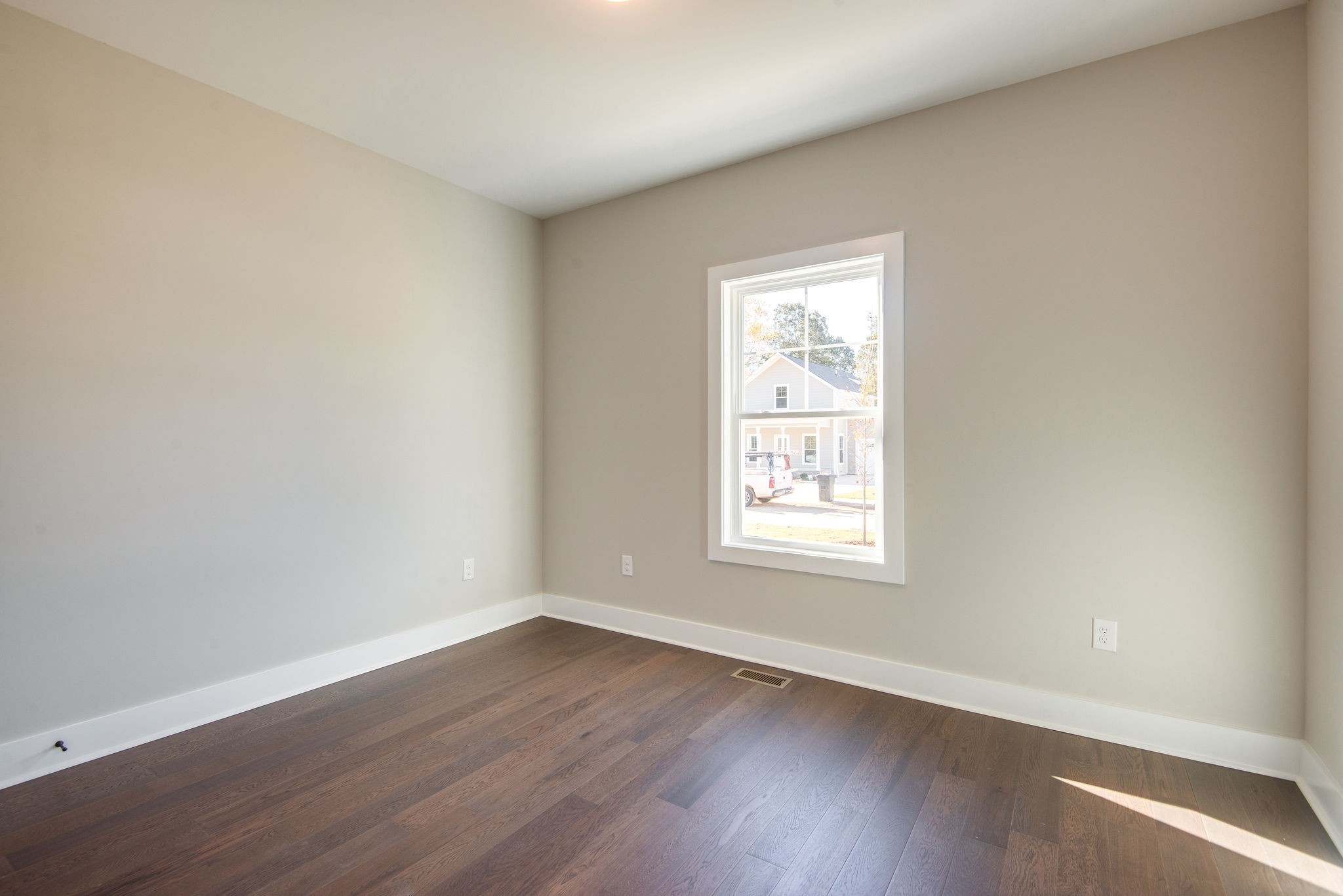 38 Sycamore Ridge West Burns, TN 37029 - Photo 20 of 46 an empty room with wooden floor and window