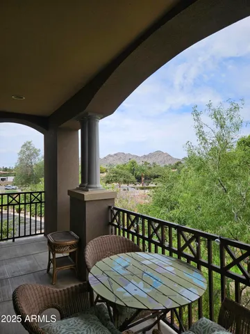 a outdoor dining space with furniture and a patio
