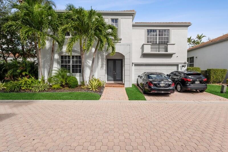 4285 Northwest 66th Place Boca Raton, FL 33496 - Photo 1 of 20 01_4285NW66thPlace_57_FrontView_FlexMLS8