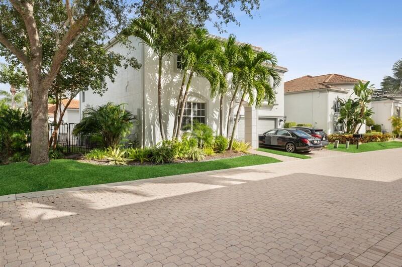 4285 Northwest 66th Place Boca Raton, FL 33496 - Photo 19 of 20 19_4285NW66thPlace_58_SideView_FlexMLS80