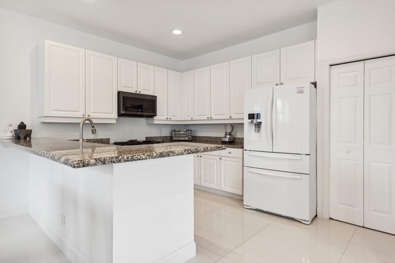 4285 Northwest 66th Place Boca Raton, FL 33496 - Photo 2 of 20 04_4285NW66thPlace_5_Kitchen_FlexMLS800x