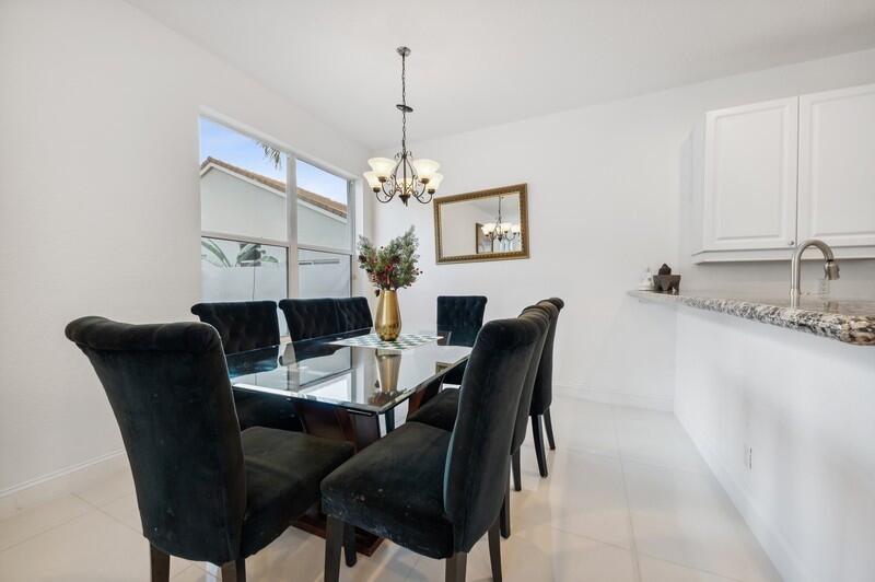 4285 Northwest 66th Place Boca Raton, FL 33496 - Photo 5 of 20 06_4285NW66thPlace_2_DiningRoom_FlexMLS8