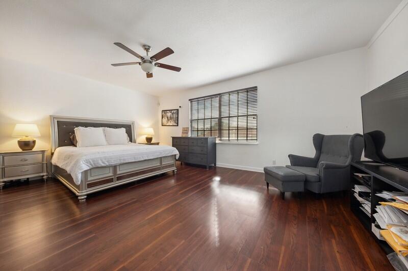 4285 Northwest 66th Place Boca Raton, FL 33496 - Photo 9 of 20 10_4285NW66thPlace_14_PrimaryBedroom_Fle