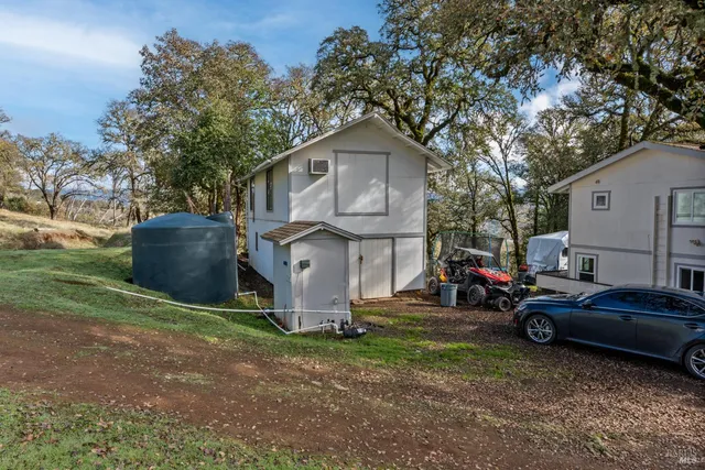 a view of a house with a back yard