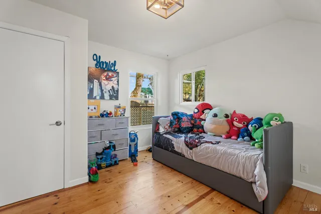 a bedroom with furniture and a bed