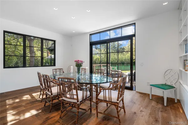 a view of a dining room with furniture window and outside view