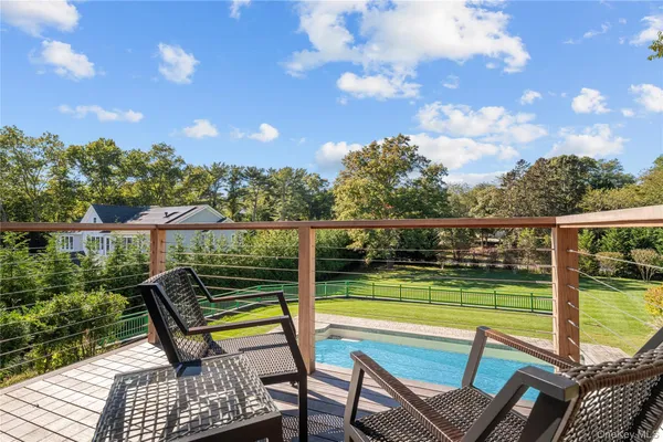 a view of a swimming pool with a patio