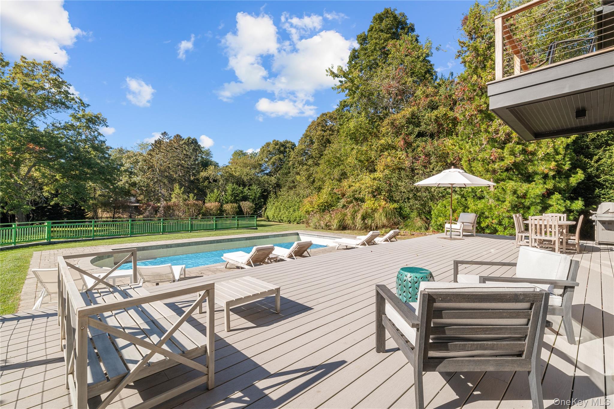 15 Atterbury Road Southampton, NY 11968 - Photo 37 of 46 a view of a swimming pool with a patio