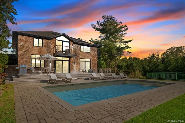 a view of a house with a swimming pool