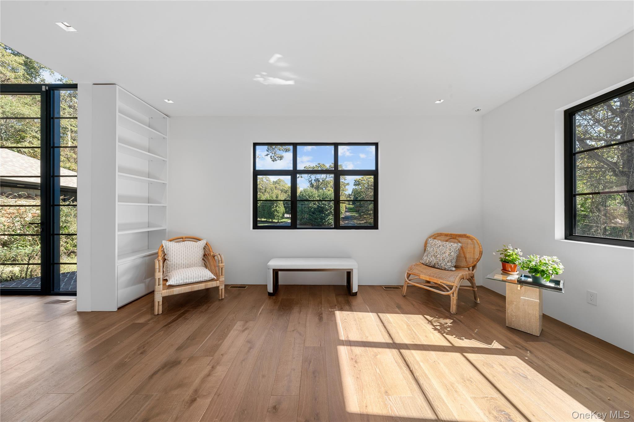 15 Atterbury Road Southampton, NY 11968 - Photo 10 of 46 a living room with furniture and a large window