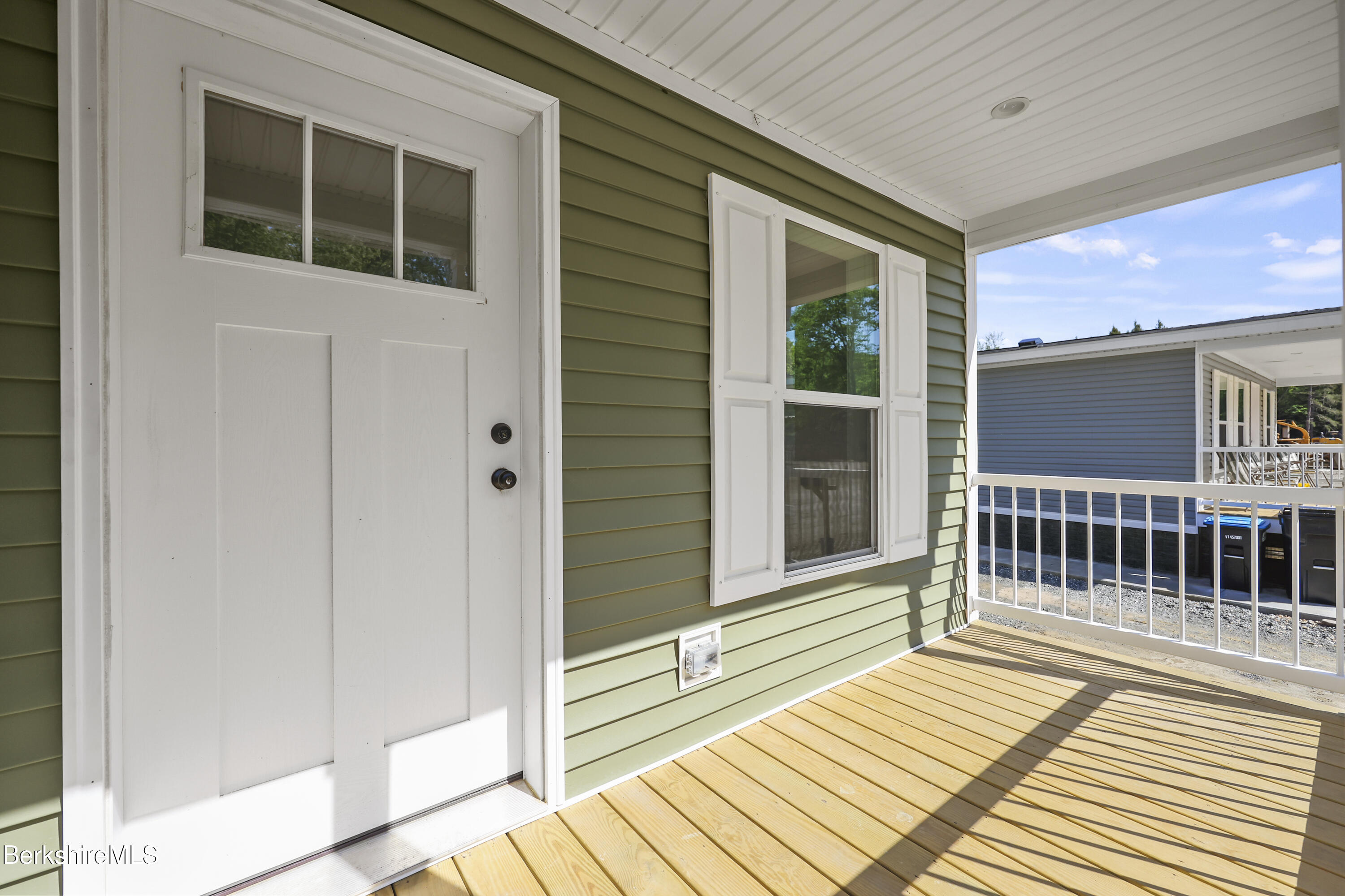 395 Cheshire Road, Unit 102 Pittsfield, MA 01201 - Photo 4 of 28 a view of a house with wooden floor