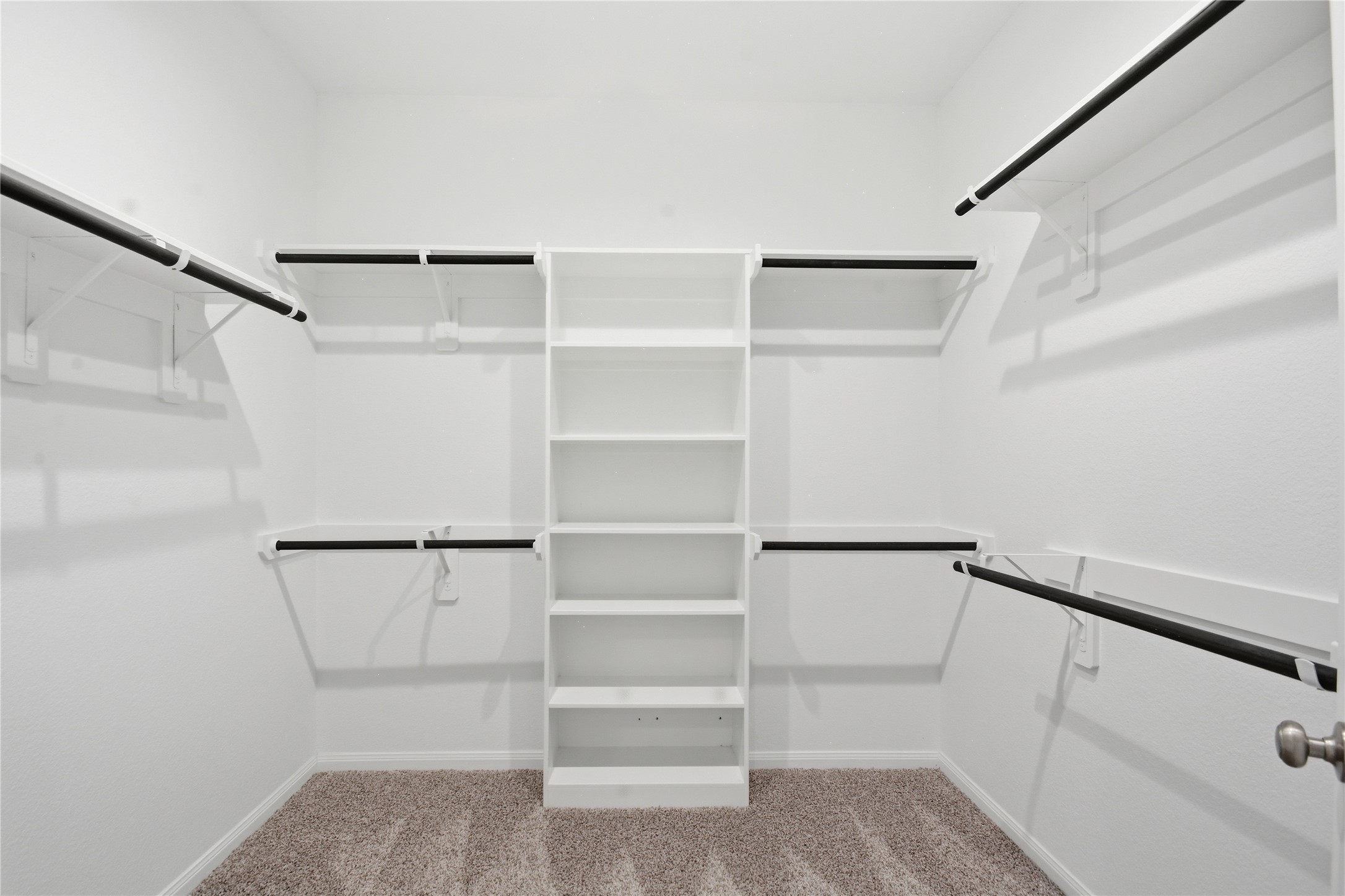 4106 Split Ivy Drive Houston, TX 77080 - Photo 23 of 34 a view of walk in closet with empty racks