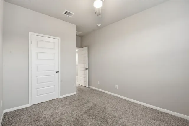 an empty room with closet