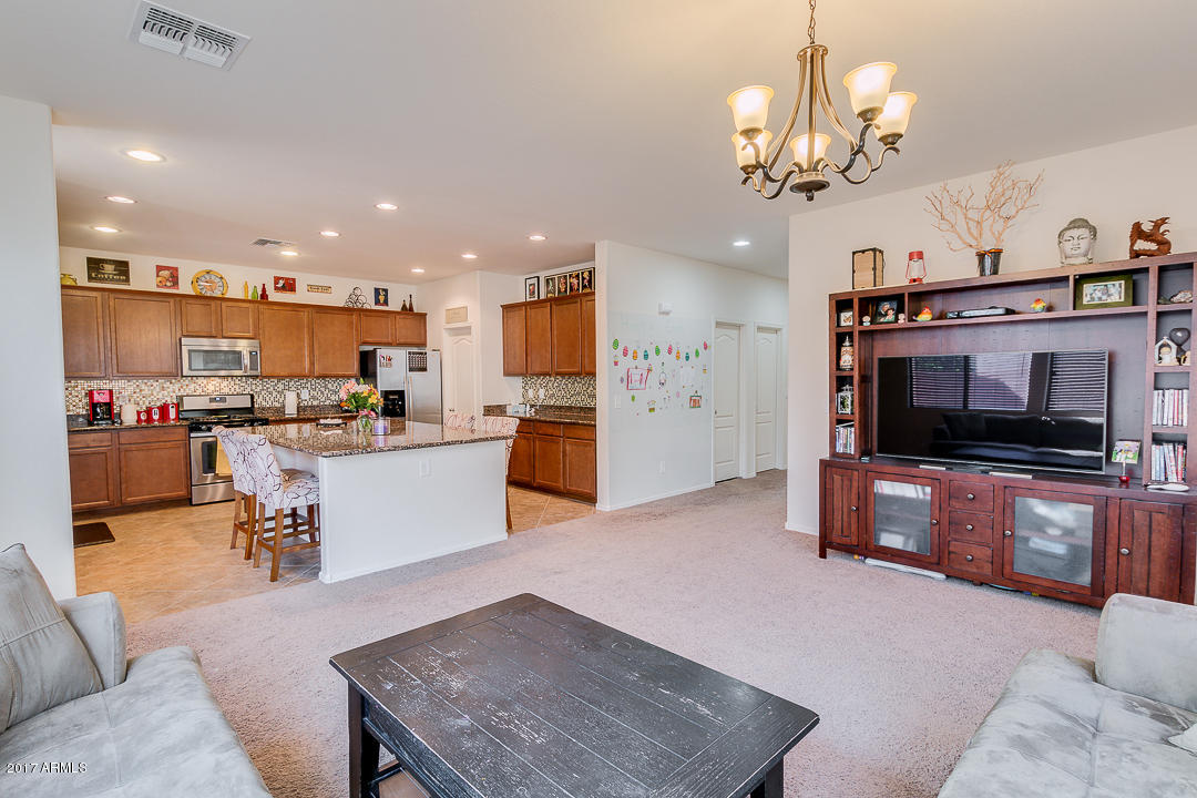 2099 South Martingale Road Gilbert, AZ 85295 - Photo 12 of 43 a view of a kitchen and dining room