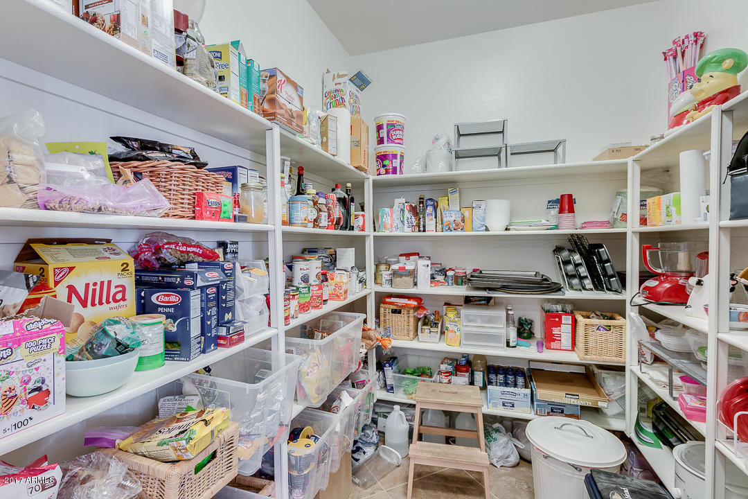 2099 South Martingale Road Gilbert, AZ 85295 - Photo 18 of 43 a utility room with toys and toys