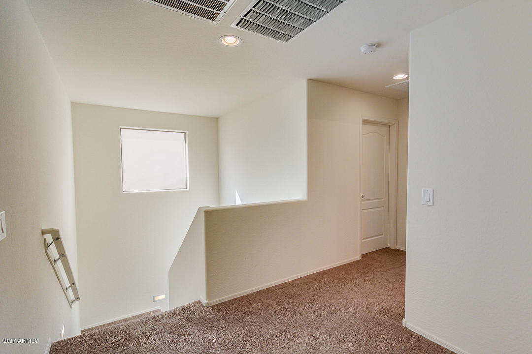 2099 South Martingale Road Gilbert, AZ 85295 - Photo 21 of 43 an empty room with windows