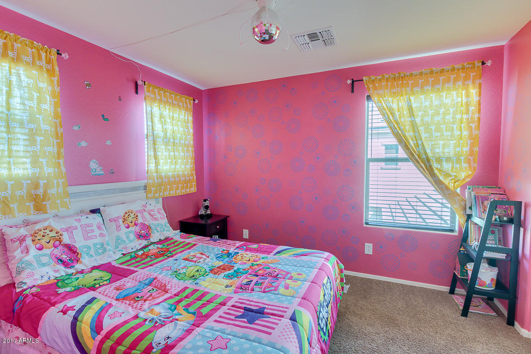 2099 South Martingale Road Gilbert, AZ 85295 - Photo 29 of 43 a bedroom with a bed and a window