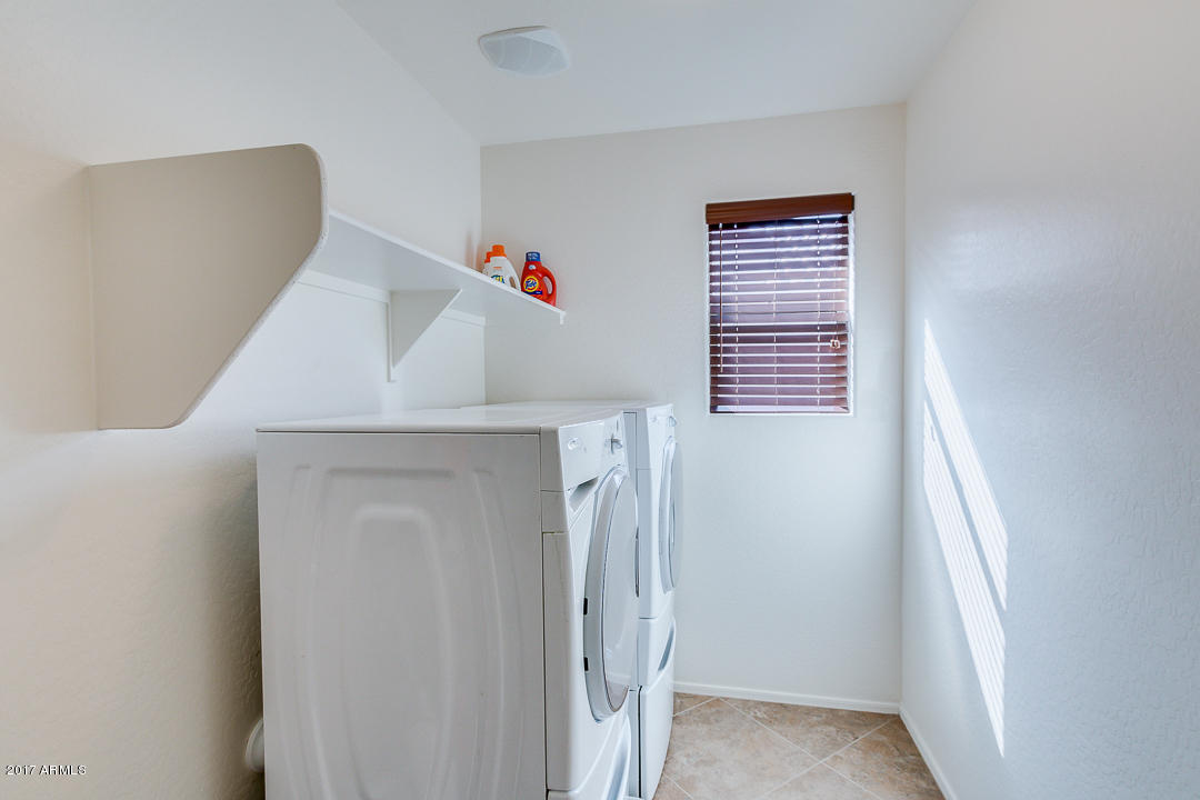 2099 South Martingale Road Gilbert, AZ 85295 - Photo 32 of 43 a view of a livingroom with washer and dryer