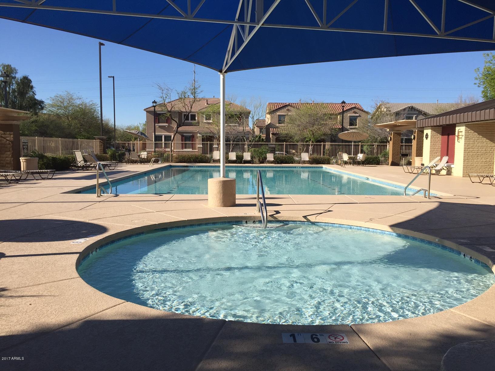 2099 South Martingale Road Gilbert, AZ 85295 - Photo 41 of 43 a view of a swimming pool with a deck