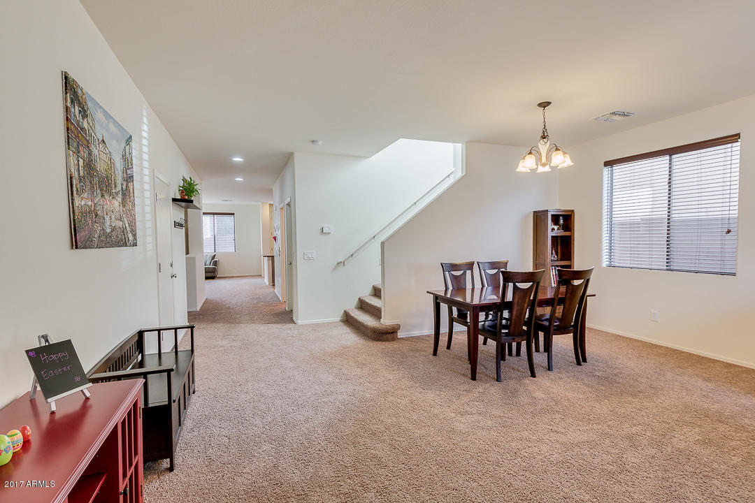 2099 South Martingale Road Gilbert, AZ 85295 - Photo 6 of 43 a view of a livingroom with furniture and a livingroom