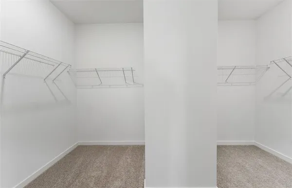 a view of a room with racks on the wall