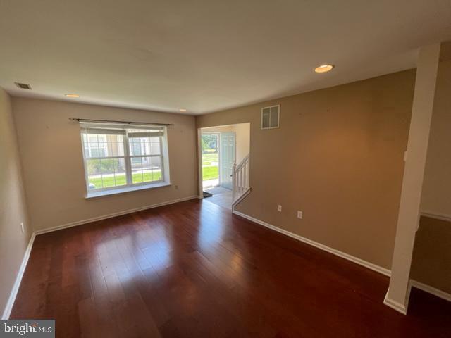 2408 Stokes Road Mount Laurel, NJ 08054 - Photo 11 of 21 an empty room with wooden floor and windows