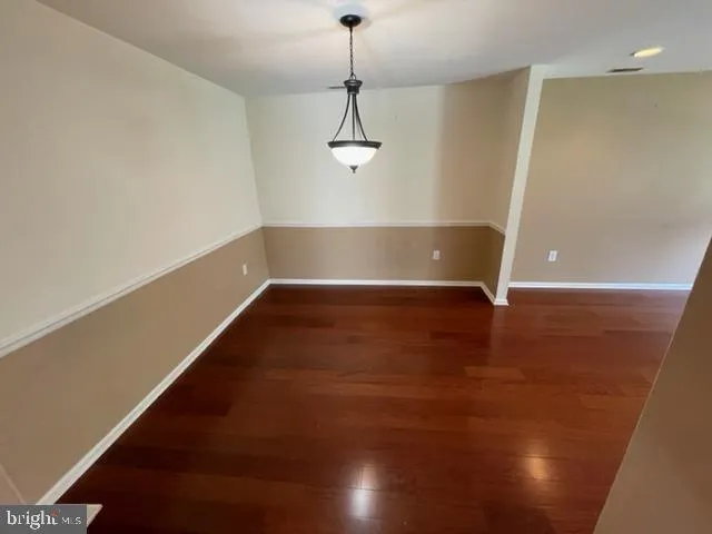 a view of room with window and ceiling fan