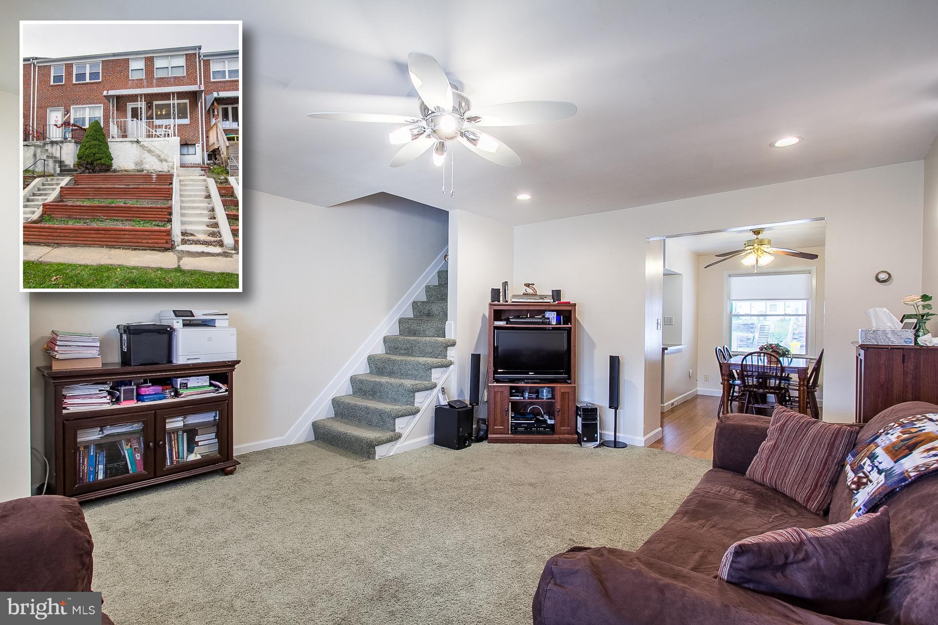 4444 Fenor Road Baltimore, MD 21227 - Photo 1 of 26 a living room with furniture and a flat screen tv