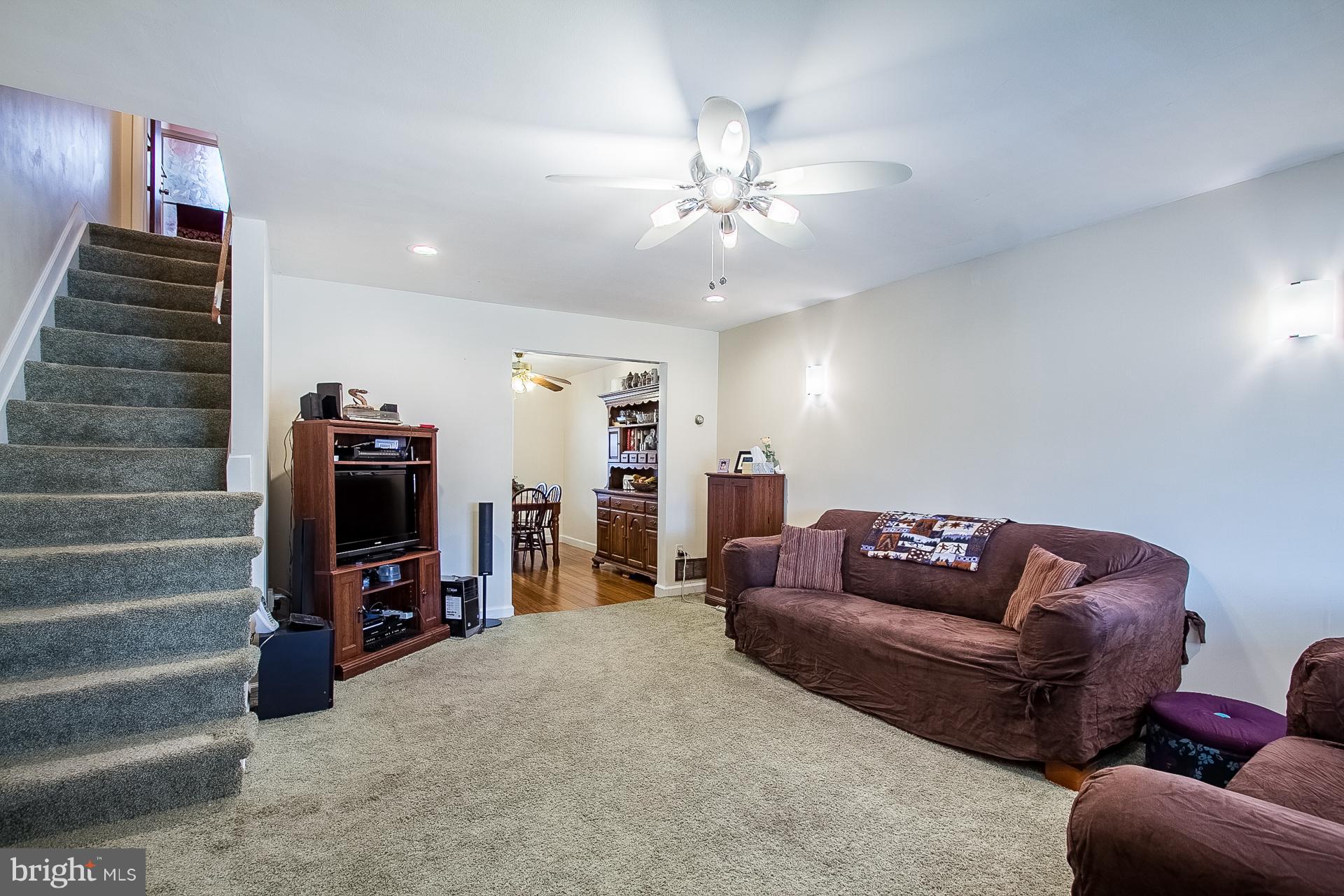 4444 Fenor Road Baltimore, MD 21227 - Photo 2 of 26 a living room with furniture and wooden floor