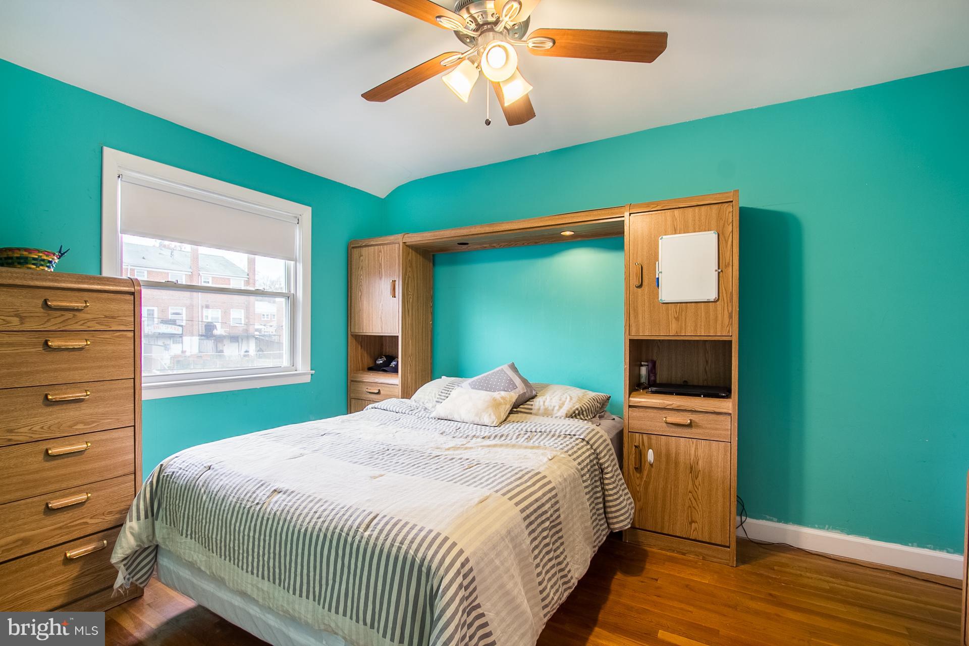 4444 Fenor Road Baltimore, MD 21227 - Photo 11 of 26 a bedroom with a bed and a window