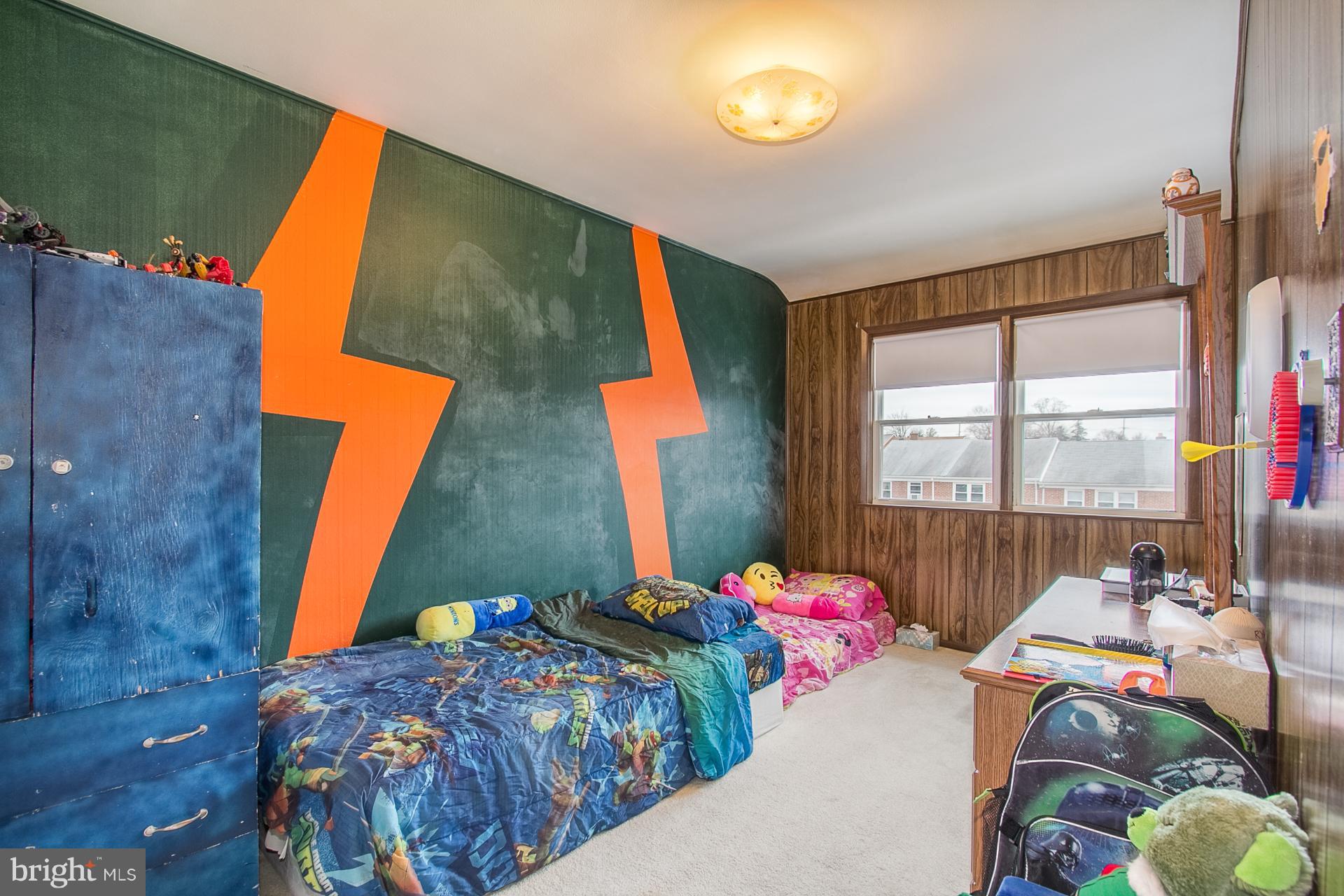 4444 Fenor Road Baltimore, MD 21227 - Photo 16 of 26 a bedroom with bed and a window