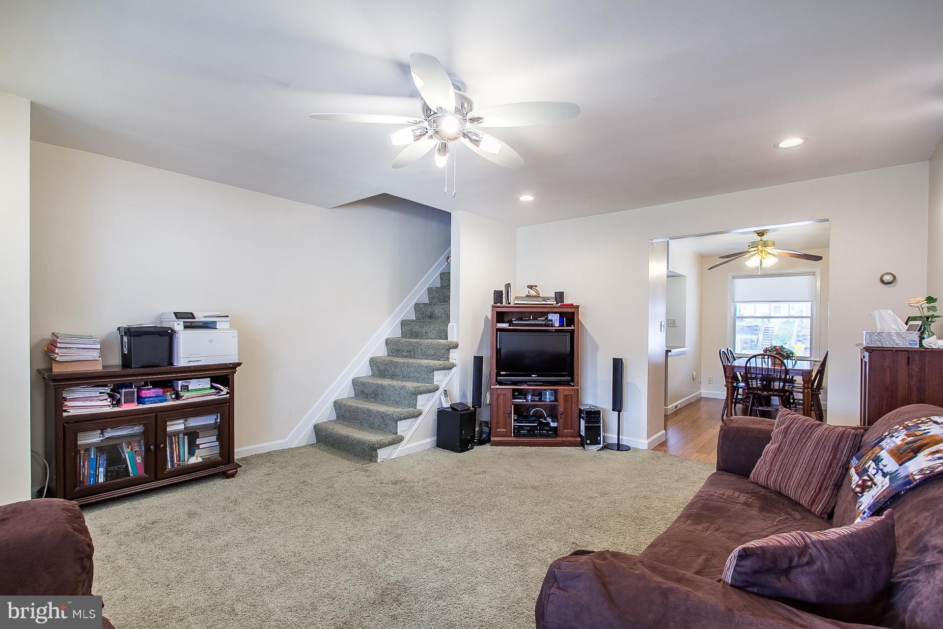 4444 Fenor Road Baltimore, MD 21227 - Photo 3 of 26 a living room with furniture and a flat screen tv