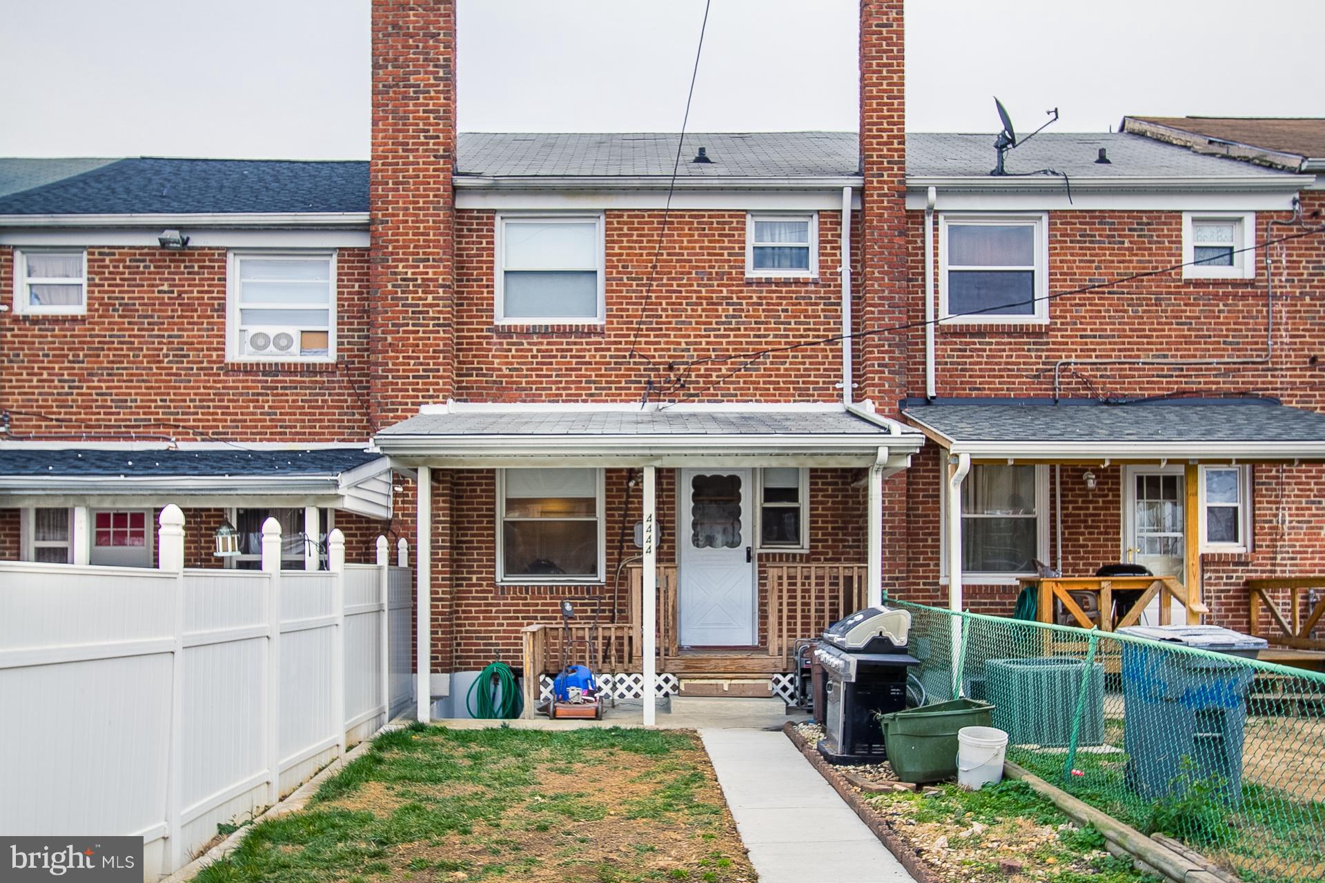 4444 Fenor Road Baltimore, MD 21227 - Photo 24 of 26 a view of a brick building with many windows