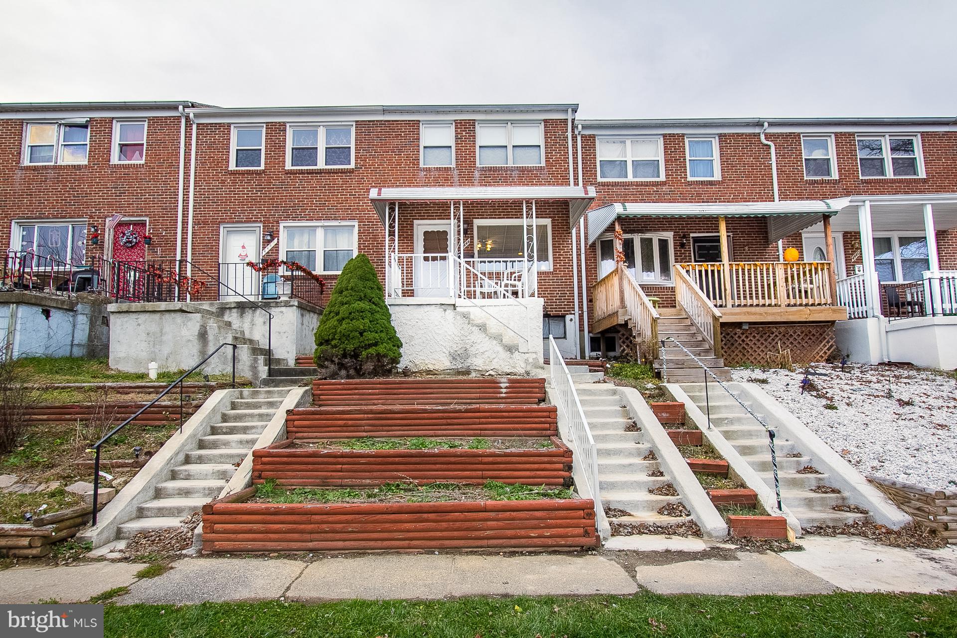 4444 Fenor Road Baltimore, MD 21227 - Photo 26 of 26 a front view of a house with a swimming pool