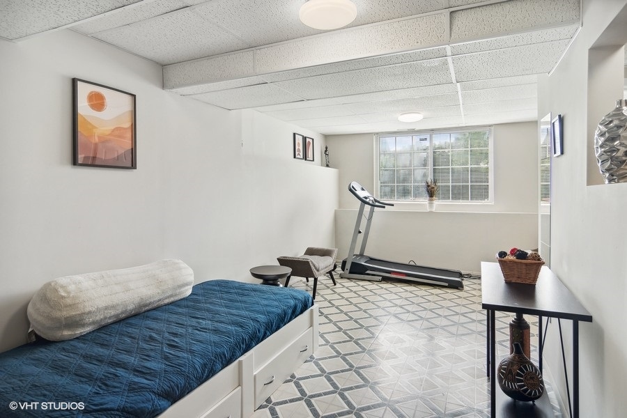 440 Spaulding Road Bartlett, IL 60103 - Photo 20 of 27 a bedroom with a bed and a window
