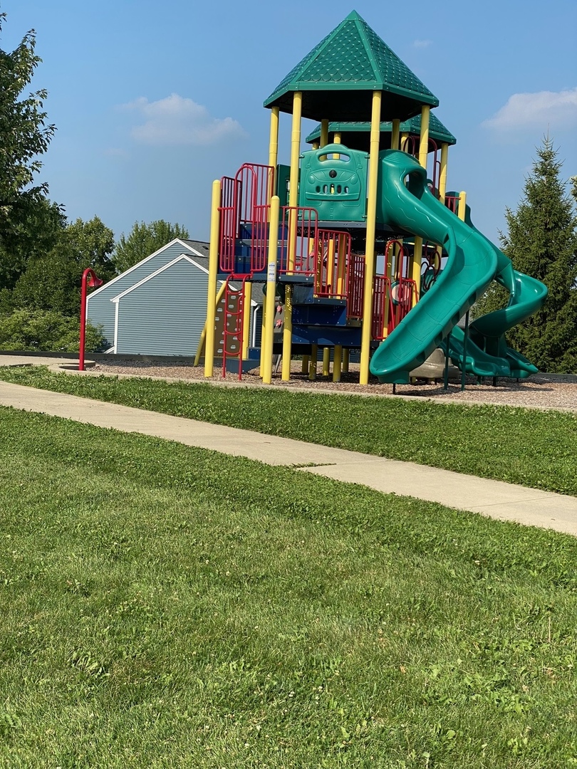 440 Spaulding Road Bartlett, IL 60103 - Photo 25 of 27 a front view of a house with a yard