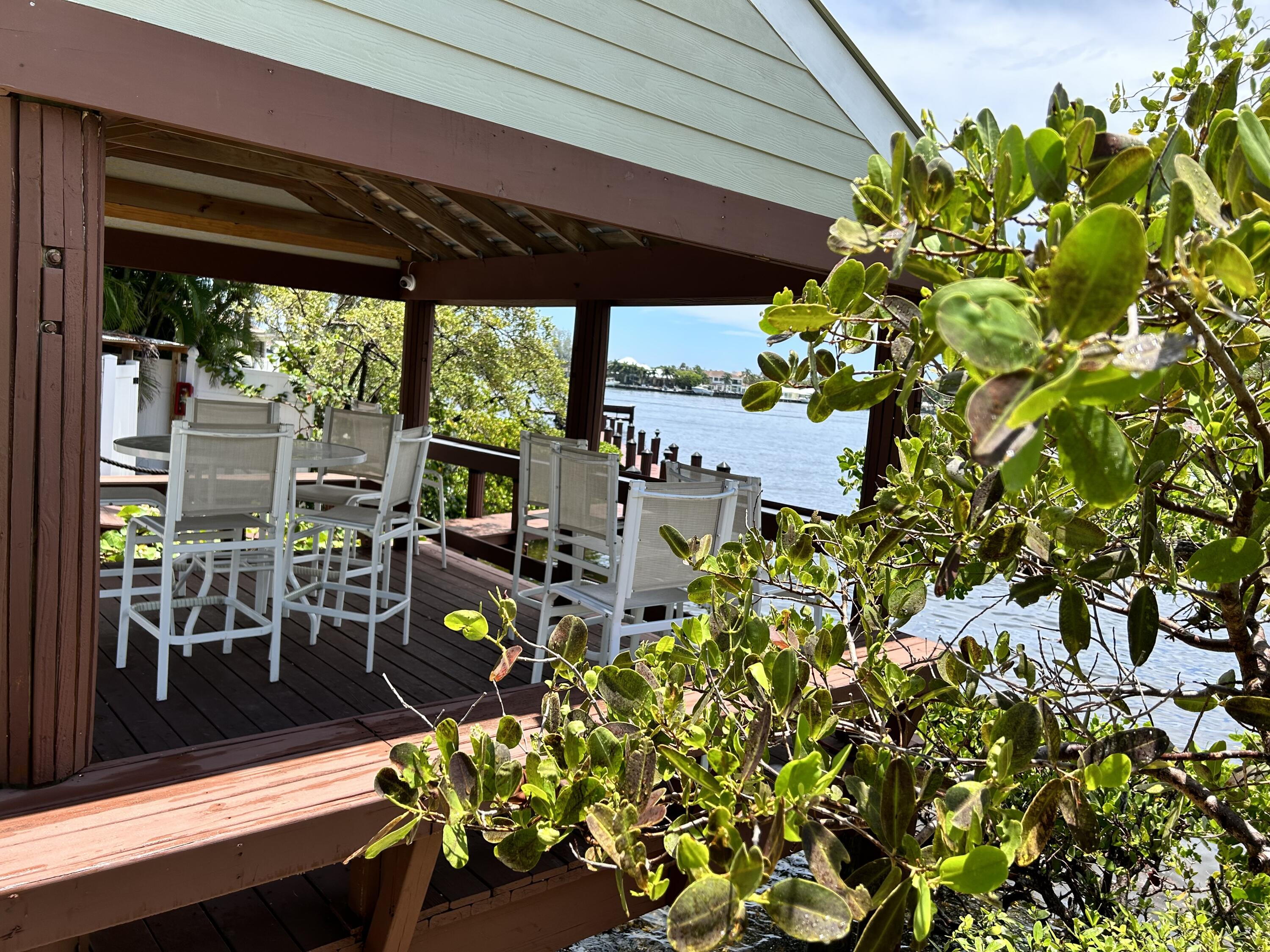 756 Mariners Way Boynton Beach, FL 33435 - Photo 59 of 66 Covered area near pool with long dock