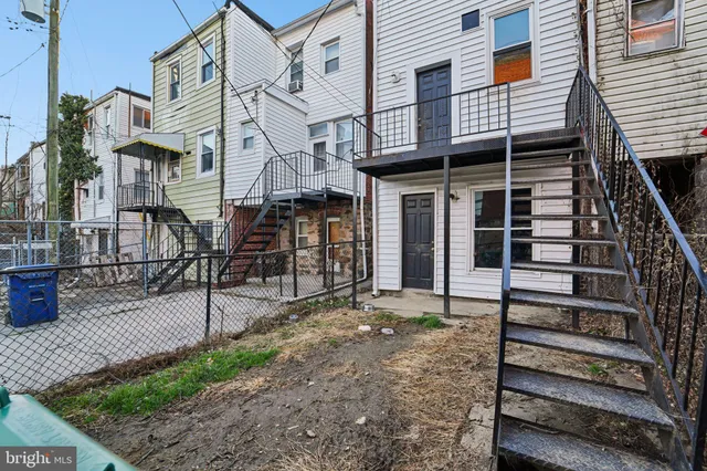 a view of a house with a street