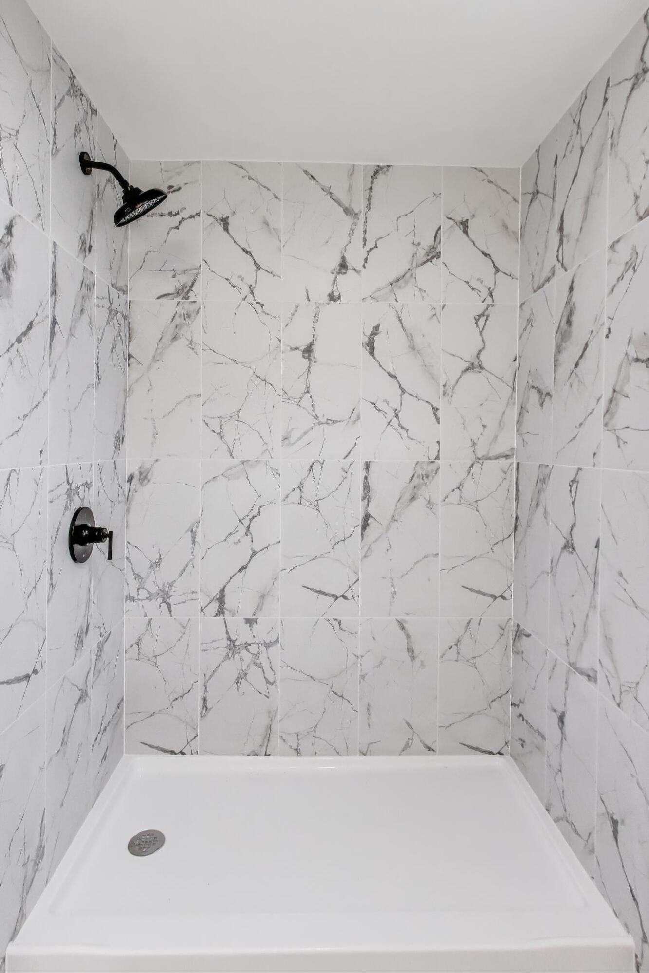 102 South Karwick Road Michigan City, IN 46360 - Photo 16 of 30 a bathroom with a bathtub