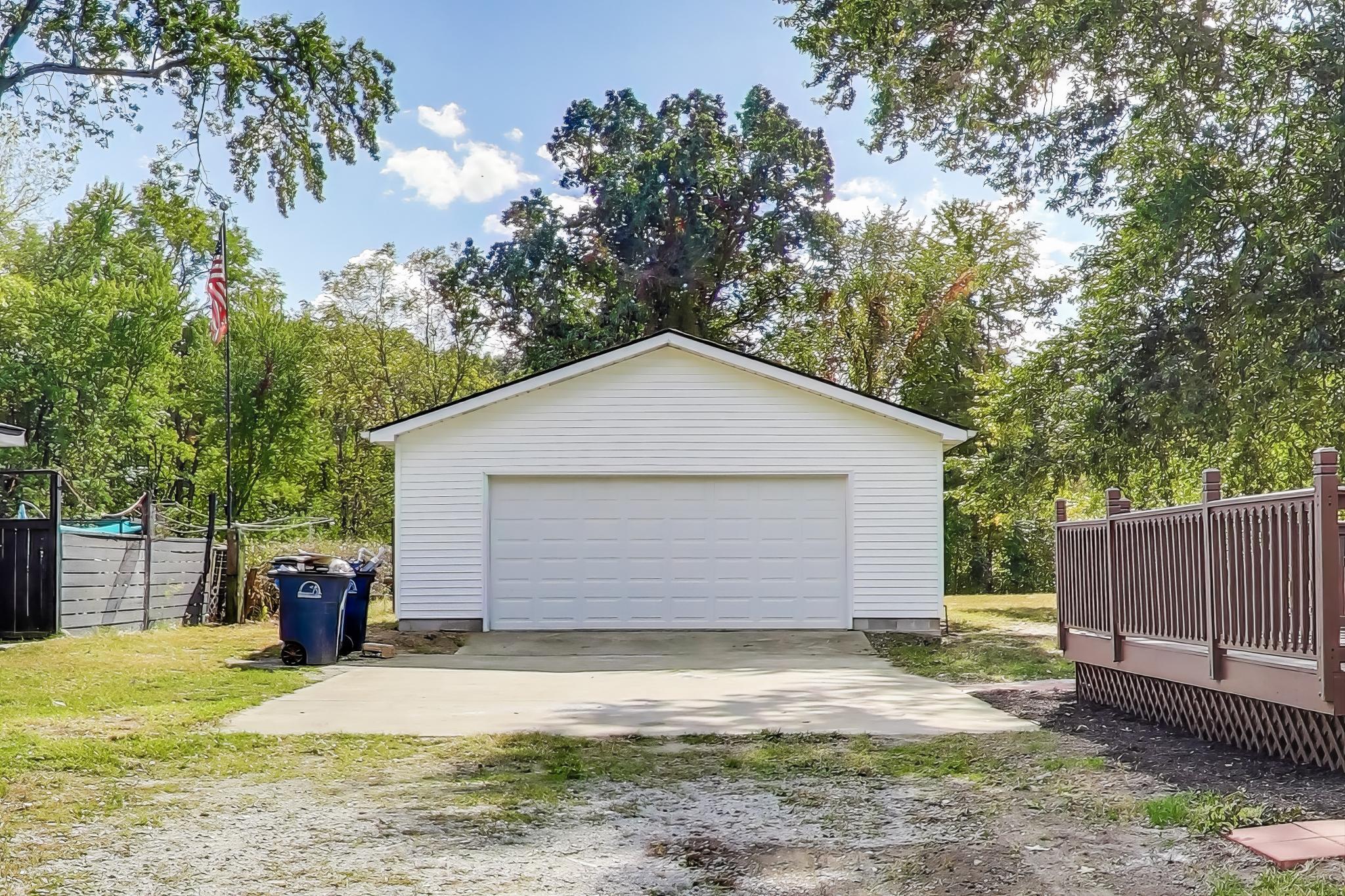 102 South Karwick Road Michigan City, IN 46360 - Photo 19 of 30 a view of a backyard of the house