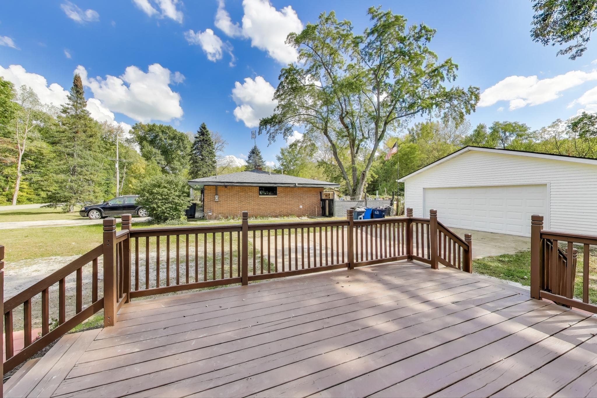 102 South Karwick Road Michigan City, IN 46360 - Photo 20 of 30 a view of a house with wooden deck